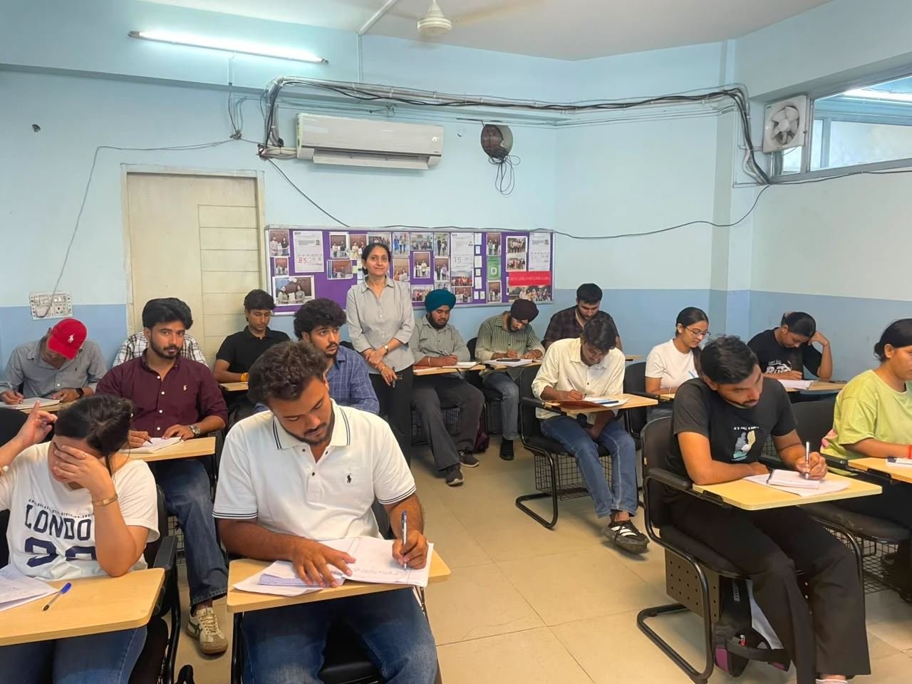 Students taking a mock IELTS test at IELTS Simulator